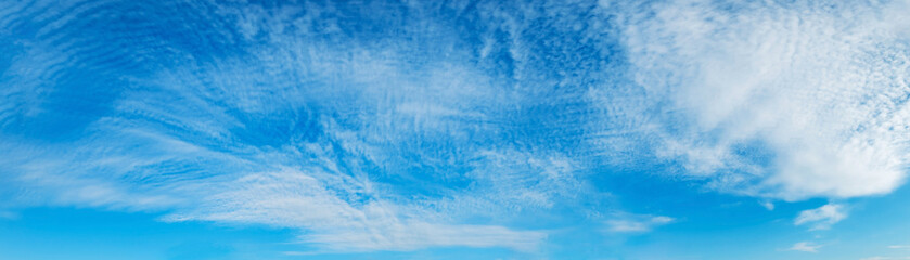 Panorama sky with cloud on a sunny day. Beautiful cirrus cloud. Panoramic image.