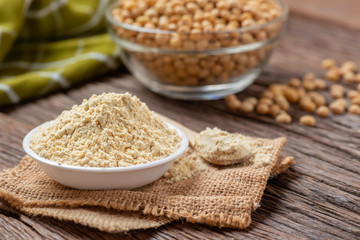 Product of soy flour in bowl with soybean, Kinako flour.
