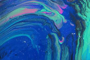 art photography of abstract marbleized effect background. mint, blue and pink creative colors. Beautiful paint.