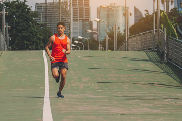 Obraz premium runner on the street be running for exercise; sport, people, exercising and lifestyle concept