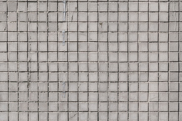 汚れた古いタイル壁