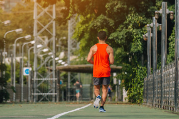 Obraz premium runner on the street be running for exercise; sport, people, exercising and lifestyle concept