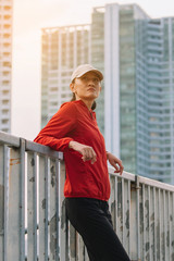 Young women runner on the street be running for exercise on city road; sport, people, exercising and lifestyle concept