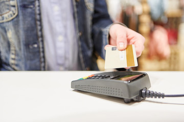 Customer makes mobile payment with cash card