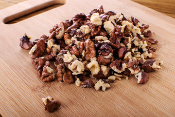 Walnut kernel in a white bowl