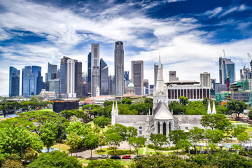 Aerial View of Downtown Singapore, with St. Andrews Cathedral and City Hall Park in Foreground...
