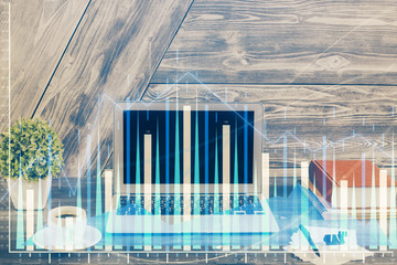 Multi exposure of chart and financial info and work space with computer background. Concept of...