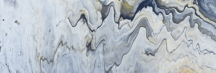 art photography of abstract marbleized effect background. gold, blue, pewder and gray creative colors. Beautiful paint.