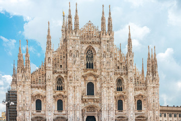 Fototapeta premium MILAN, ITALY - May 29, 2018: street view of Milan Cathedral, Dome de Milan is the cathedral church