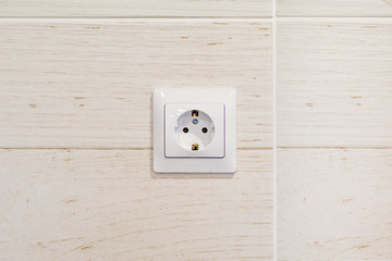 Socket on the wall in the new apartment
