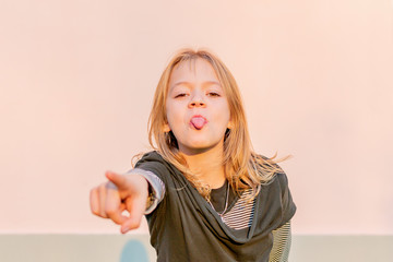 Young girl posing in front of the camera