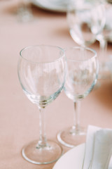 Intimate parts of the body, the atmosphere of the occasion. Wedding shoes, dress details and hands.