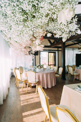 Intimate parts of the body, the atmosphere of the occasion. Wedding shoes, dress details and hands.