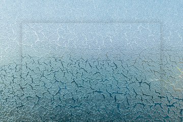 The icy glass of the car