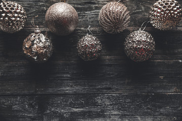 Christmas or New Year background. Vintage Christmas tree toy decoration balls over wooden background