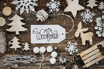 Naklejka na ściany i meble One White Label With English Text Happy Weekend. Frame Of Christmas Decoration Like Tree, Sled, Star And Fir Cone. Wooden Background With Snowflakes