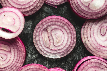 close up of sliced red onion, intended as a background image