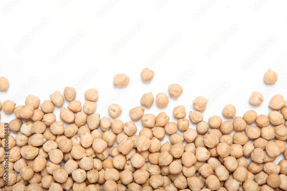 Wall mural raw chickpeas isolated on white