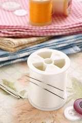 Sewing needles threads and buttons 