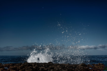 Splashing Atlantic ocean waves at Tenerife island coast.