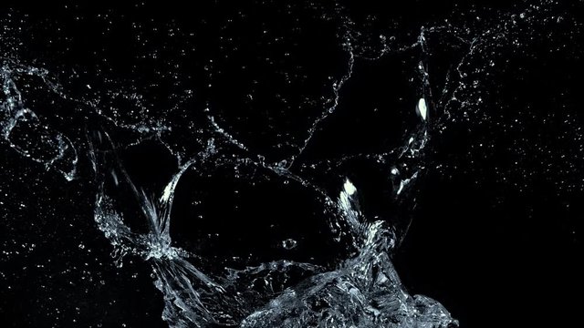 Super Slow Motion Shot of Water Splash at 1000fps Isolated on Black Background.
