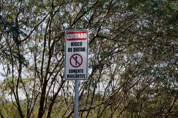 Forbidden Board in portuguese.   Caution, risk of falling. Vigilant only