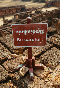 Be Careful Warning sign in Angkor Wat Temple