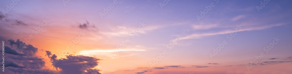 Wall mural sunset sky with clouds (wide background panorama).