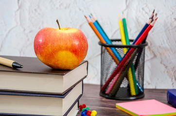 school concept. school supplies on a wooden background. Go to school.