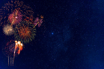 Fireworks with blur milky way background