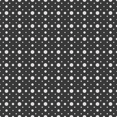 White circles and dots on a black background. Abstract seamless circles background.