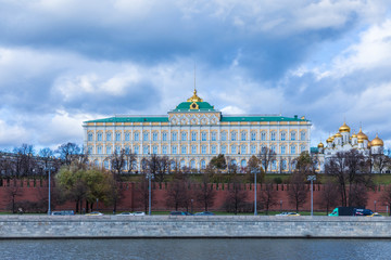 Moscow Kremlin with Grand Kremlin Palace, the government residence of the president of Russia. View from the embankment of Moskva river. Day urban landscape in the cloudy autumn weather