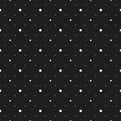 White circles and dots on a black background. Abstract seamless circles background.