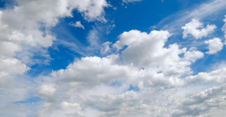 Blue summer sunny day sky with clouds (wide background panorama)