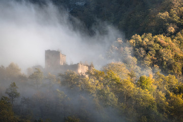 Fototapeta na wymiar Ruined castle in the clouds