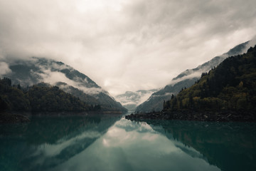 Obraz premium blue mountain lake with clouds