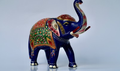 ceramic elephant painted with indues motifs - obrazy, fototapety, plakaty
