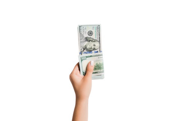 Female hand giving money on white isolated background. Top view of dollar banknotes. Bribe concept....