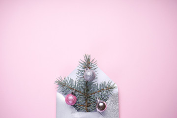 Christmas composition. Christmas tree in the envelope, the minimum Christmas card, fir branch with...