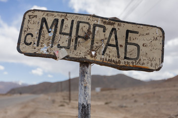 Tadjikistan, signpost announcing Murgab town, Pamir Highway