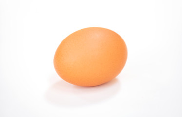 Raw single brown chicken egg isolated on the white background, cooking healthy food         