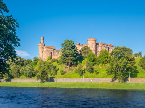 Inverness Castle sitting on a cliff overlooking the River Ness in Inverness, Highlands of Scotland.