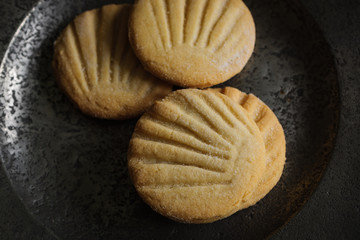 Aberffraw biscuits or Teisen Berffro a traditional Welsh shortbread from Anglesey dating back to the 13th century made with butter flour and sugar and shaped like a scallop shell.