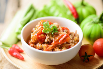 Spicy chili minced pork with tomatoes (Nam Prik Ong) eating with fresh vegetables, Thai chili paste, Northern Thai food