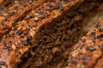 sliced wholegrain bread. Whole grain rye bread with seeds
