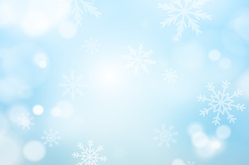 Fototapeta na wymiar Świąteczne tło bokeh i płatki śniegu