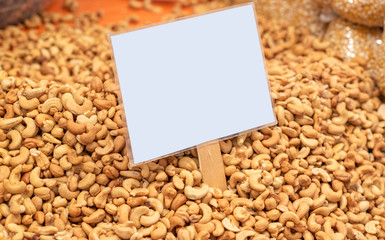 Cashew nuts as food background, top view
