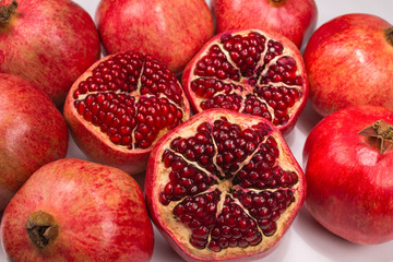 Sweet pomegranate isolated on white background.