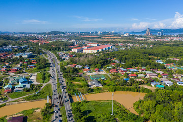Aerial drone image of beautiful rural town local lifestyle houses residential of Menggatal Town, Sabah, Malaysia