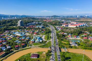 Aerial drone image of beautiful rural town local lifestyle houses residential of Menggatal Town, Sabah, Malaysia